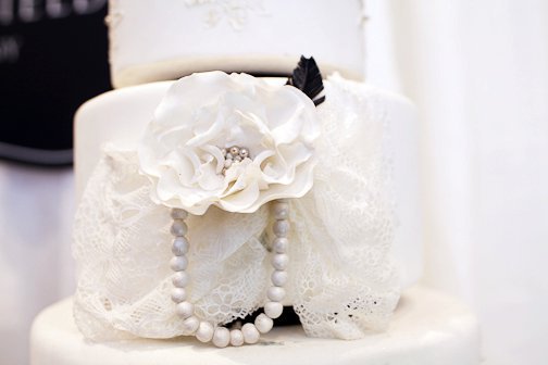 Some of the details on the 6 tier vintage wedding cake include edible lace 